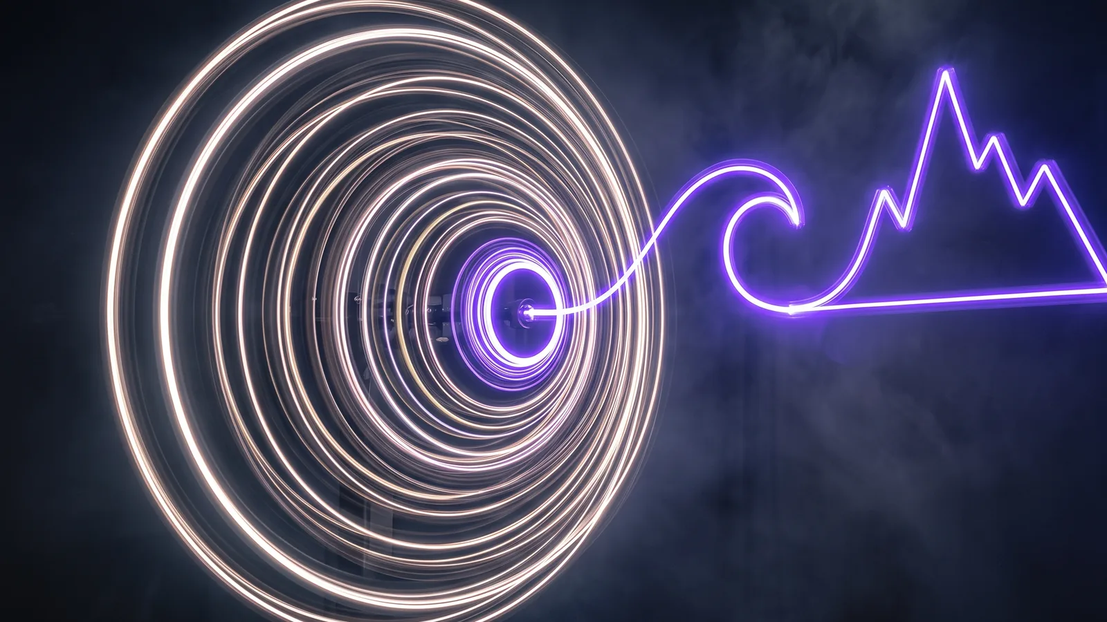Nested rings of light spinning around a common centre, their combined motion trailing into a violet line that draws a jagged mountain outline.